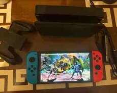 Nintendo Switch - OLED + Mortal Kombat 11  FIFA 23