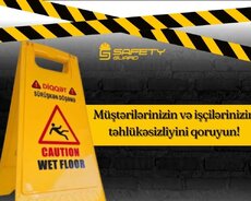 Sahənin (yerin) yaş olmasını xəbərdarlıq nişanı(iki tərəfli)