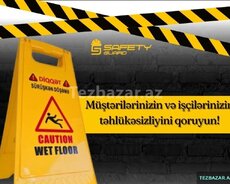 Sahənin (yerin) yaş olmasını xəbərdarlıq nişanı (iki tərəfli)