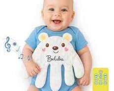 Körpə üçün yatızdıran əl oyuncağı