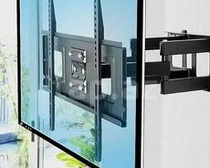 Televizorların divara yığılması